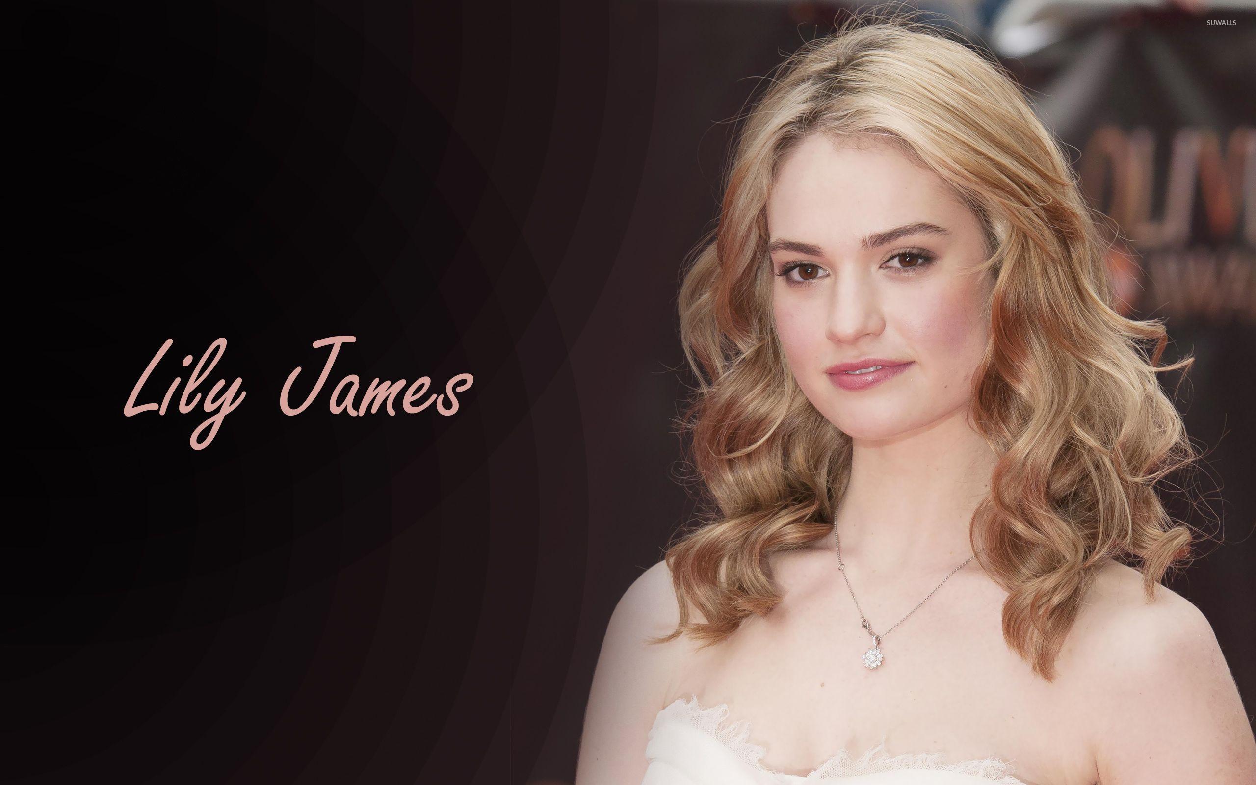 Lily James with loose curls wallpaper wallpaper