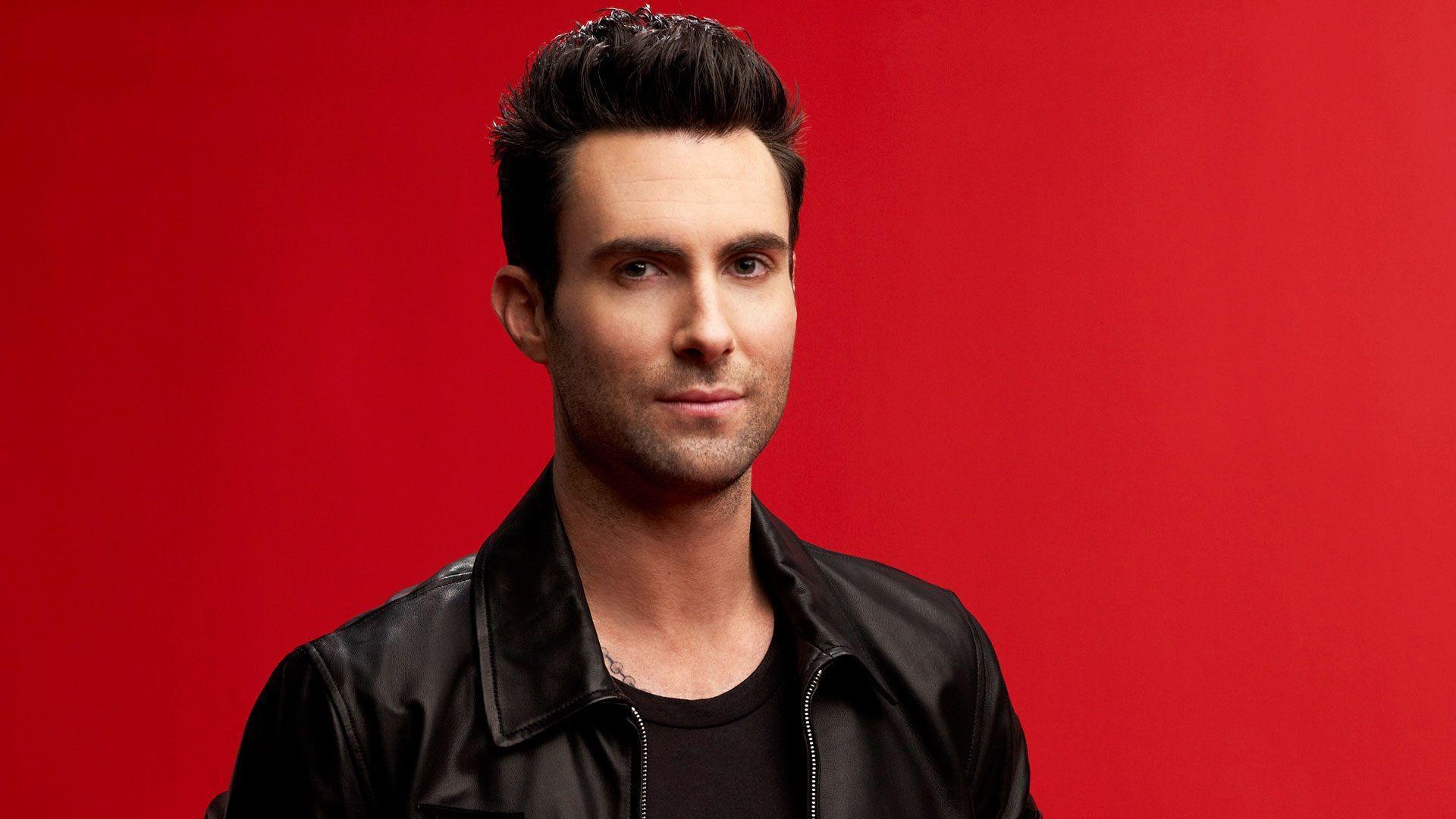 Adam Levine in Leather Jacket with Red Background desktop