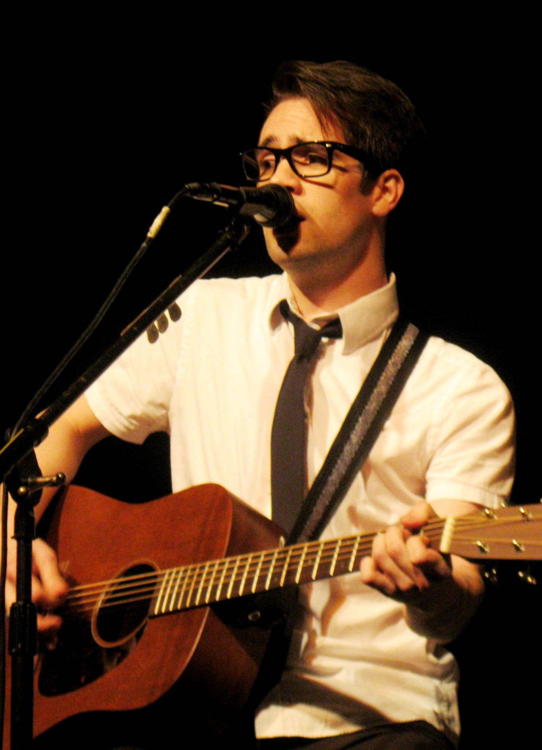 He's so adorable with his glasses on. Brendon Urie