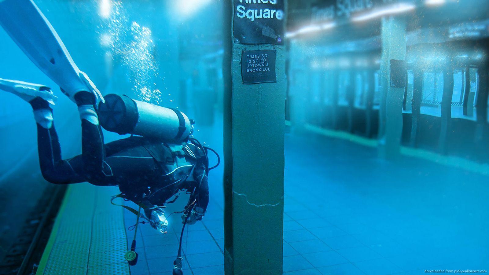 Download 1600x900 Scuba Diver In Subway Wallpaper