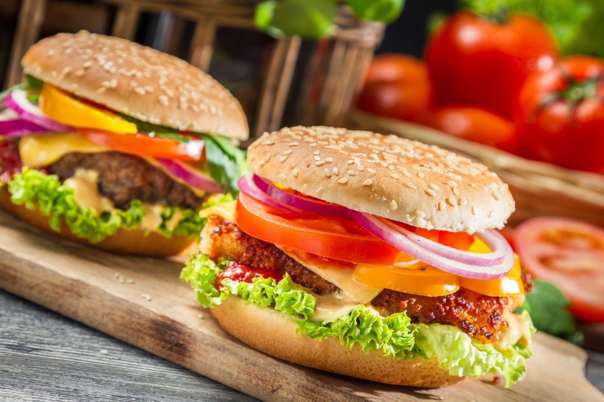 burgers fast food sandwiches board food roll sesame torment pepper