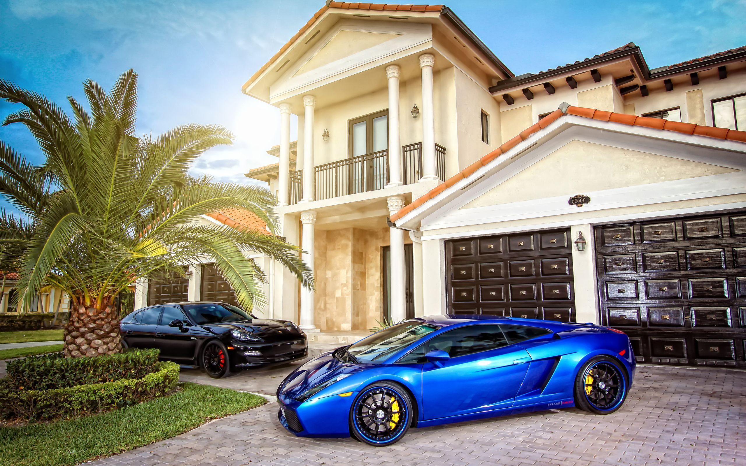 Lamborghini and Porsche in front of a Mansion widescreen wallpaper