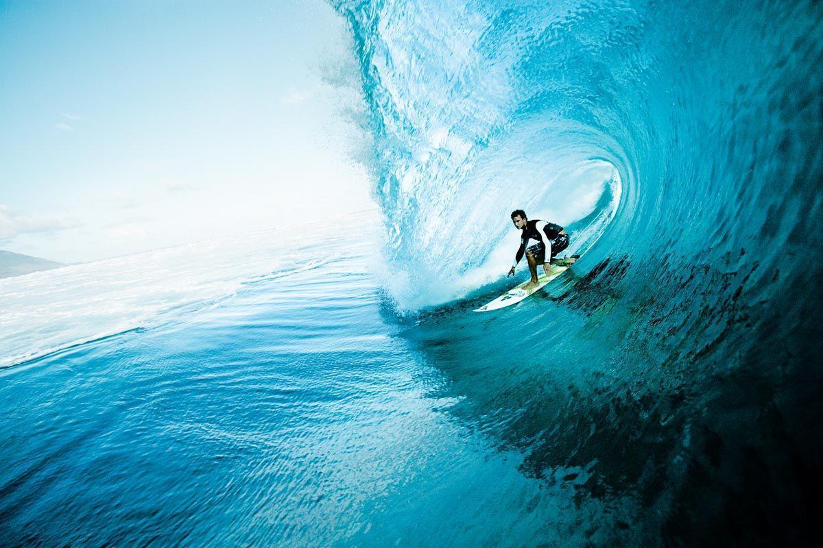 Surfing In Teahupoo Tahiti