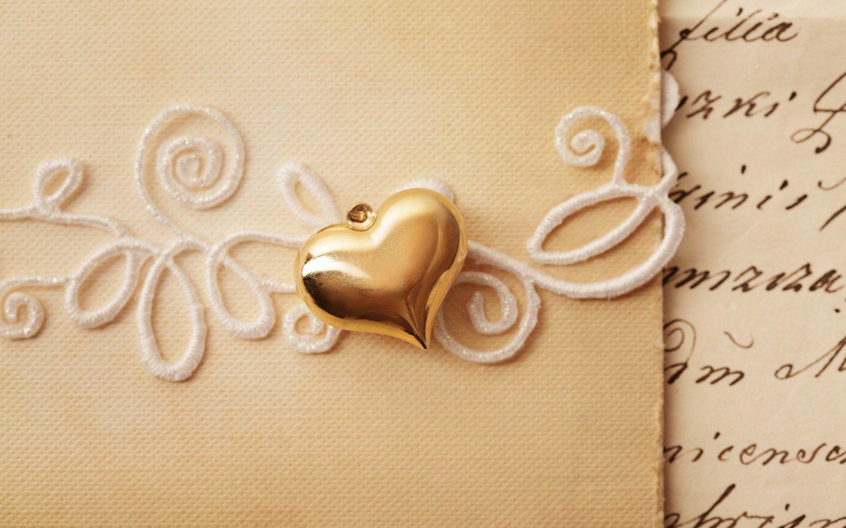 Heart Pendant On Love Letter Wallpaper