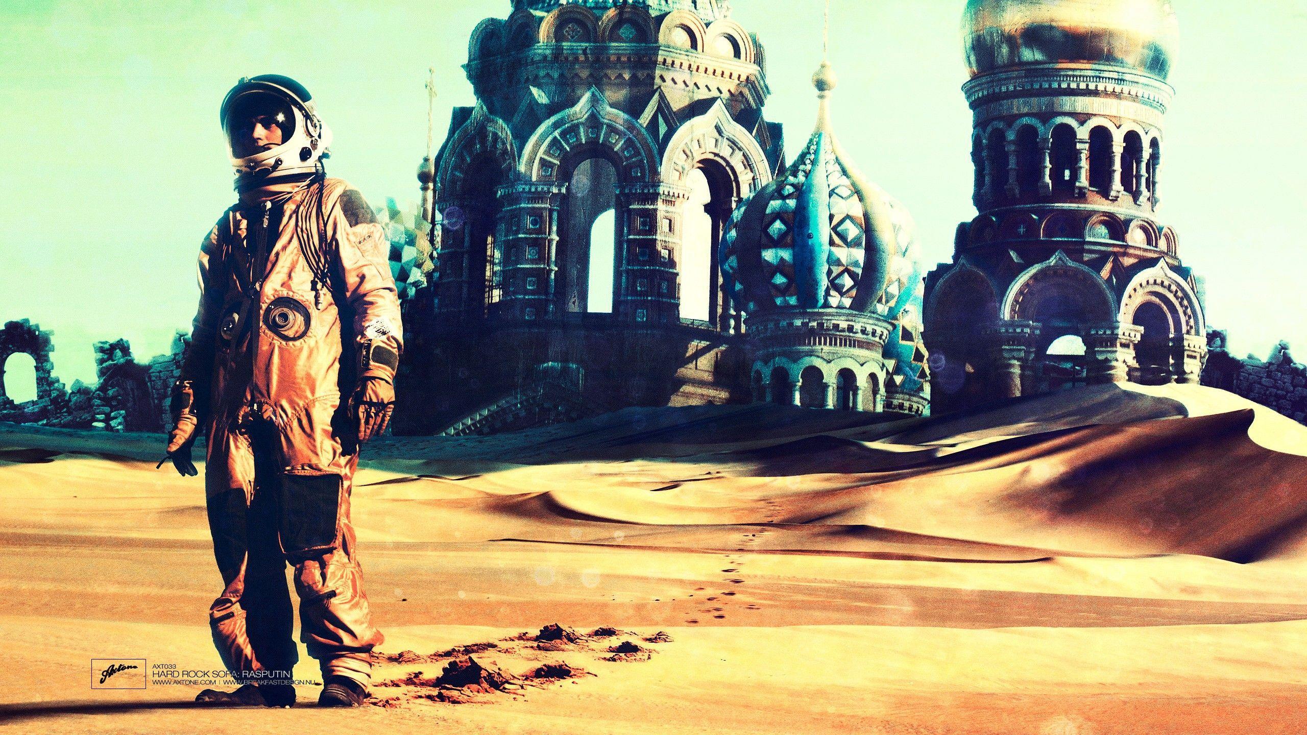 Cosmonaut in an abandoned church in the desert wallpaper