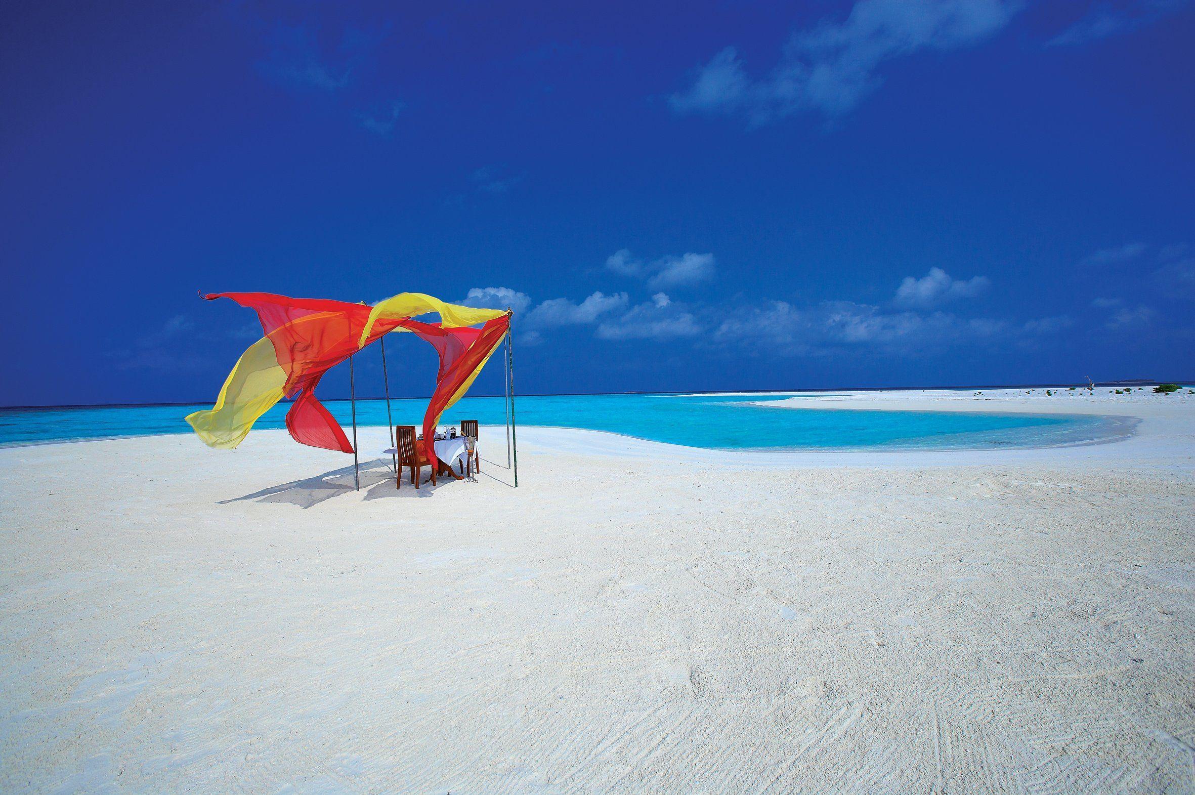 Maldives ocean beach sand water clouds chairs tropical wallpaper