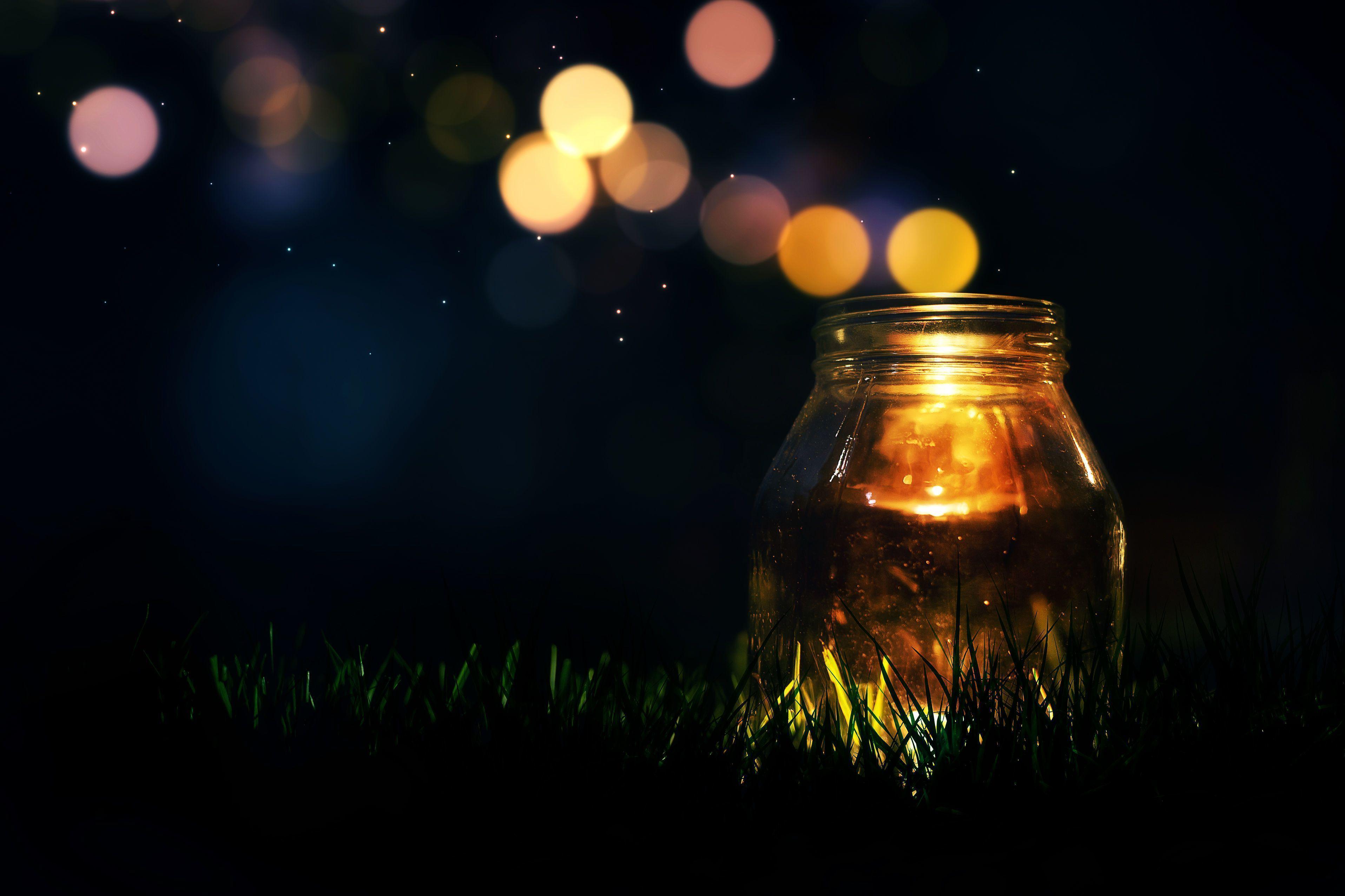Candle Light In Glass Jar Green Field Quiet Night Hope