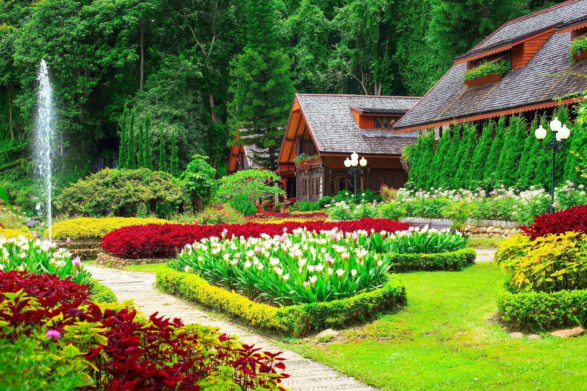 Houses with Beautiful Flower Gardens HD Wallpaper. Background
