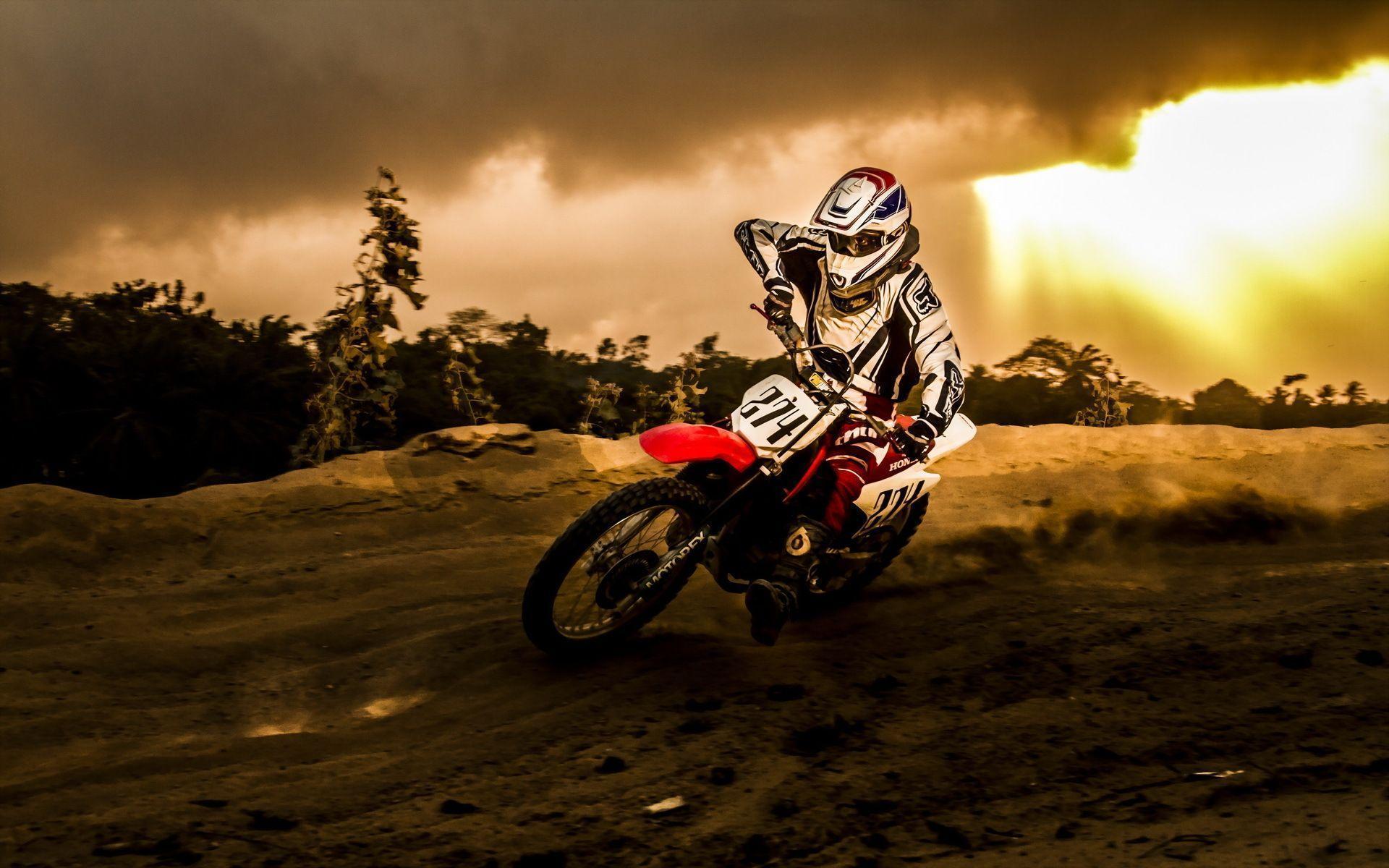 Motorcycle racing sports motocross dirt storm rain sky clouds