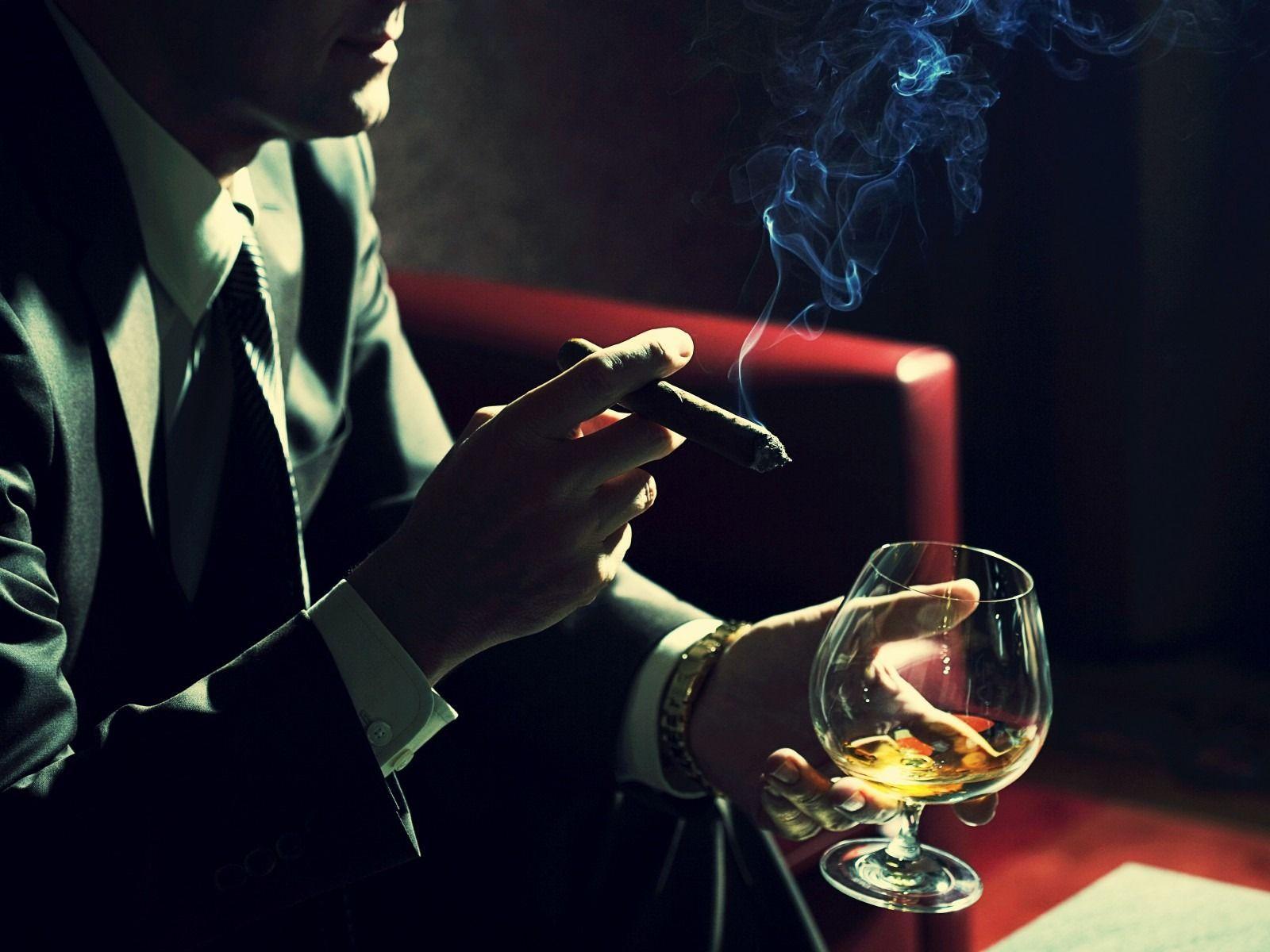 Man Smoking Cigar and Drinking Cognac 1600x1200 wallpaper