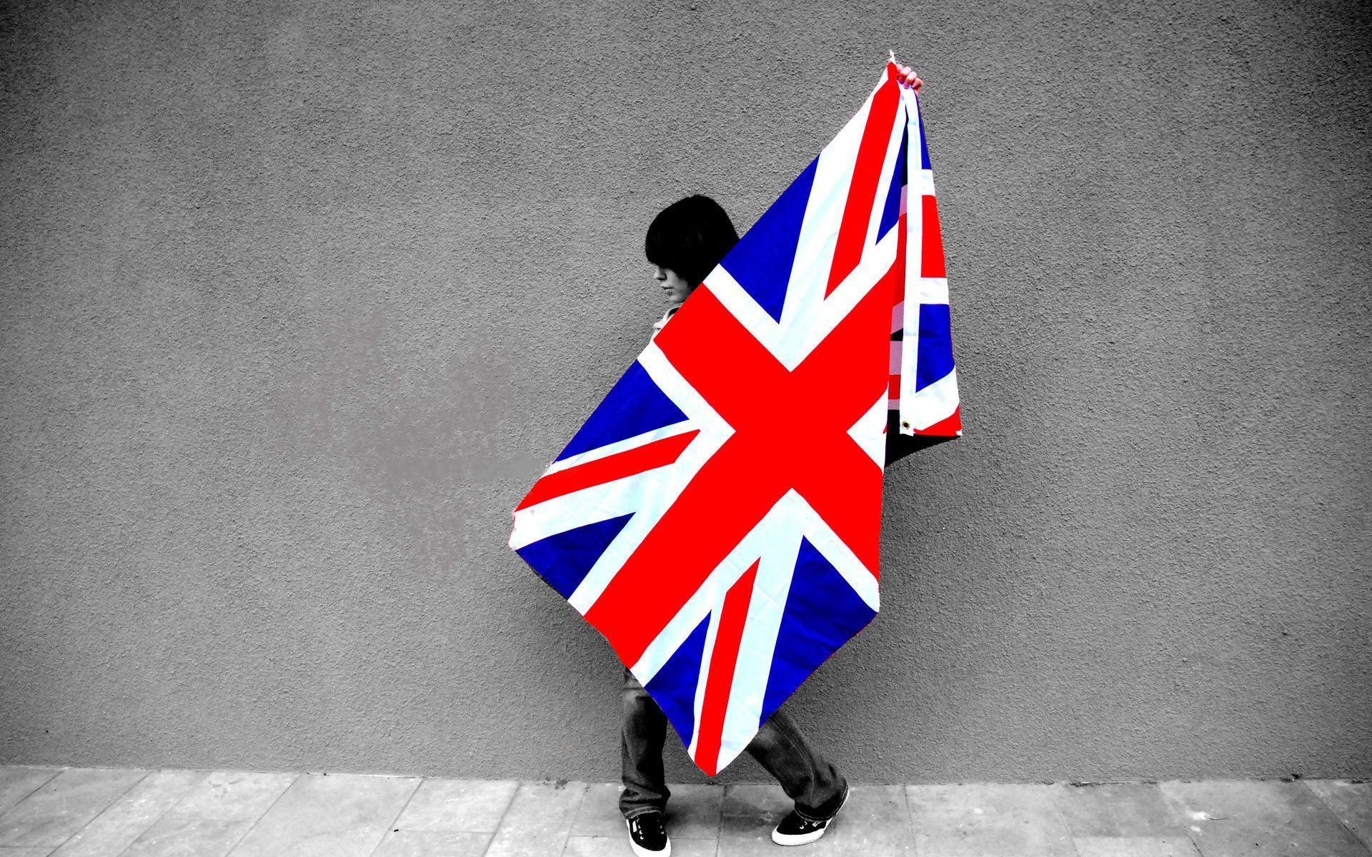 Girl Holding The Flag Of United Kingdom Wallpaper