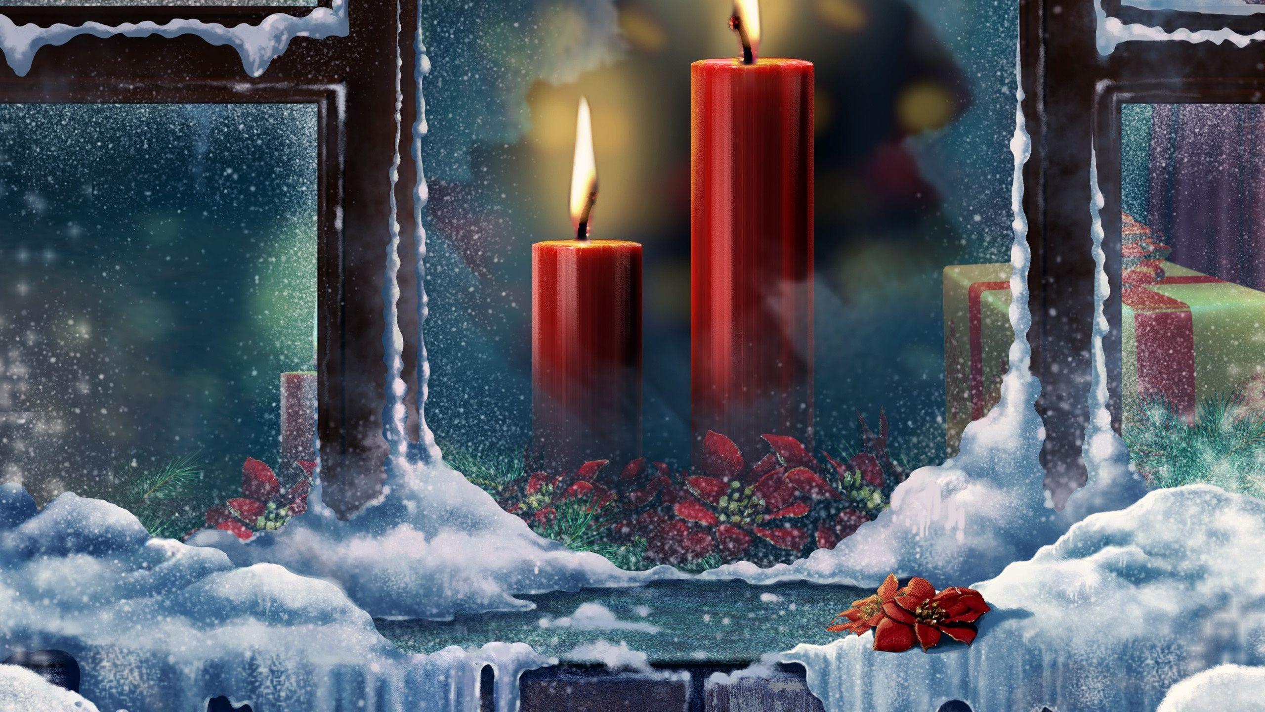 Burning candles outside the window on Christmas wallpaper