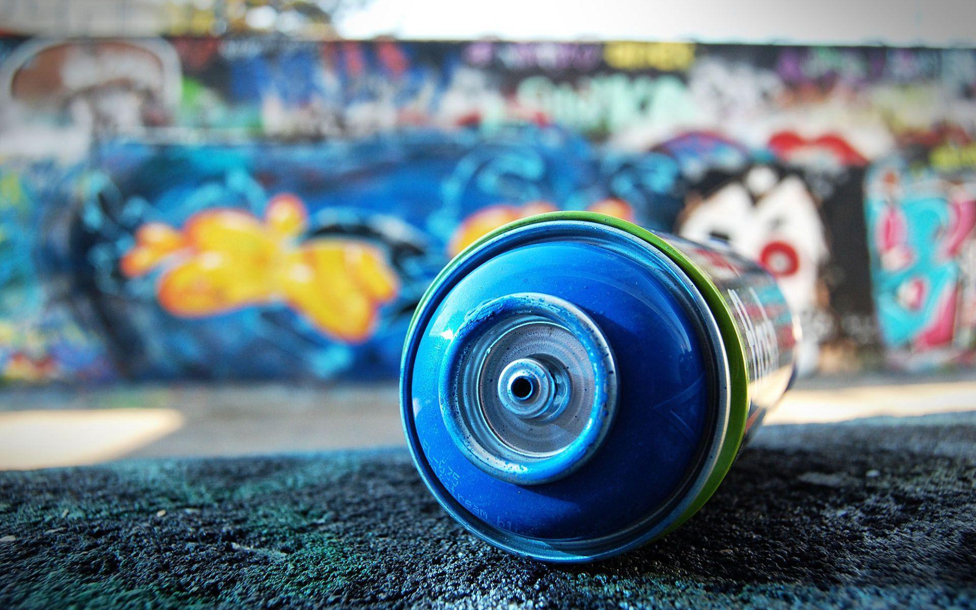 graffiti blue spray can. fotografía