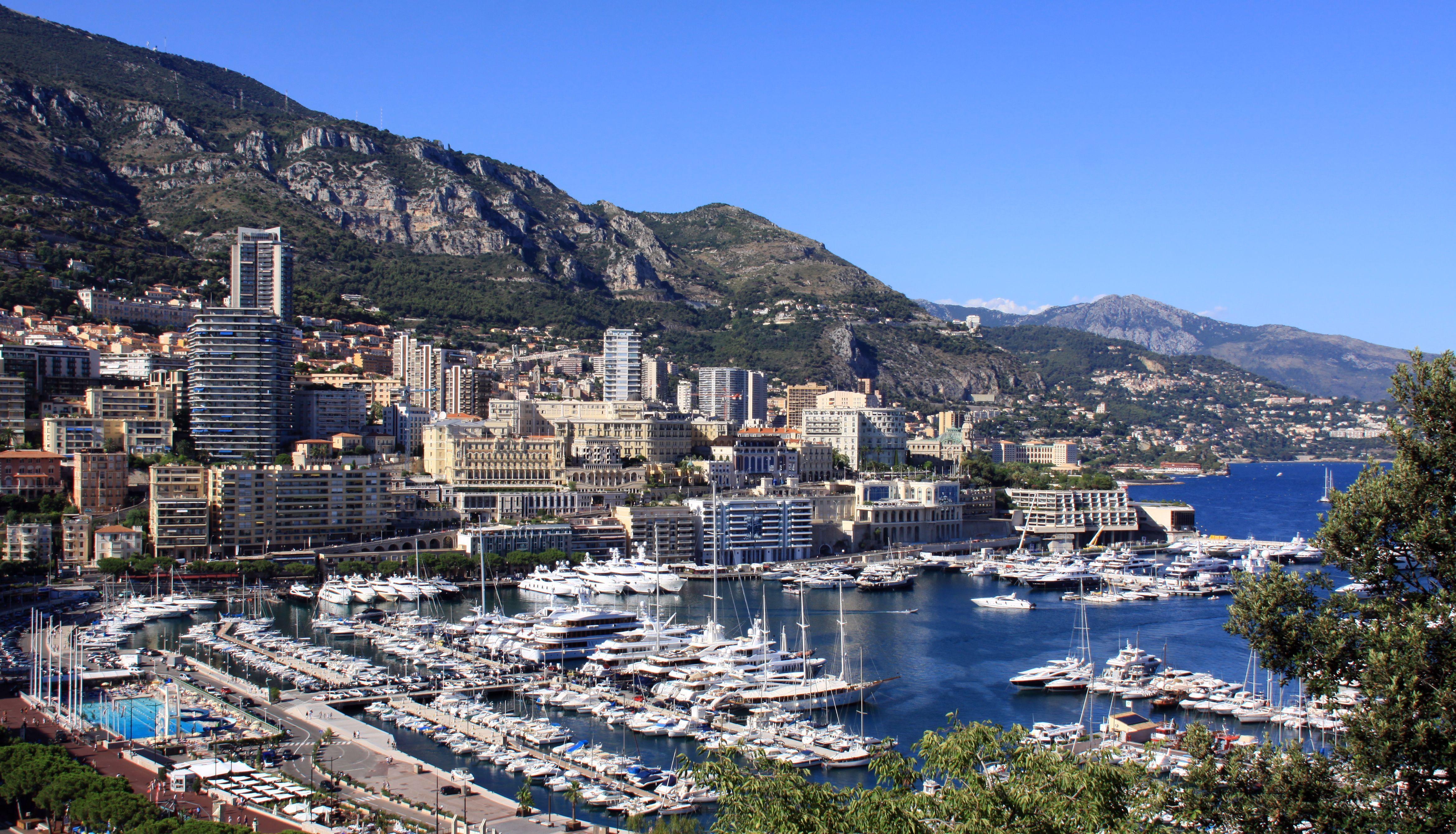 Port on city background in Monte Carlo, France wallpaper