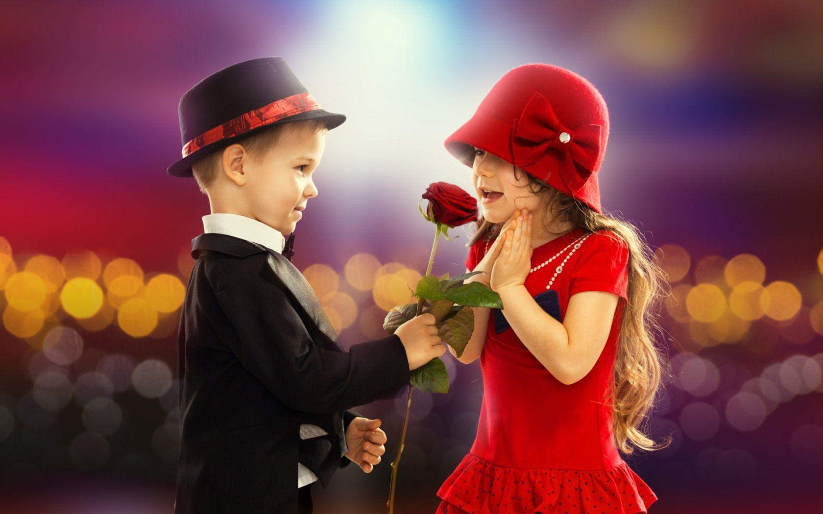 Little Boy gives Little Girl a Red Rose widescreen wallpaper