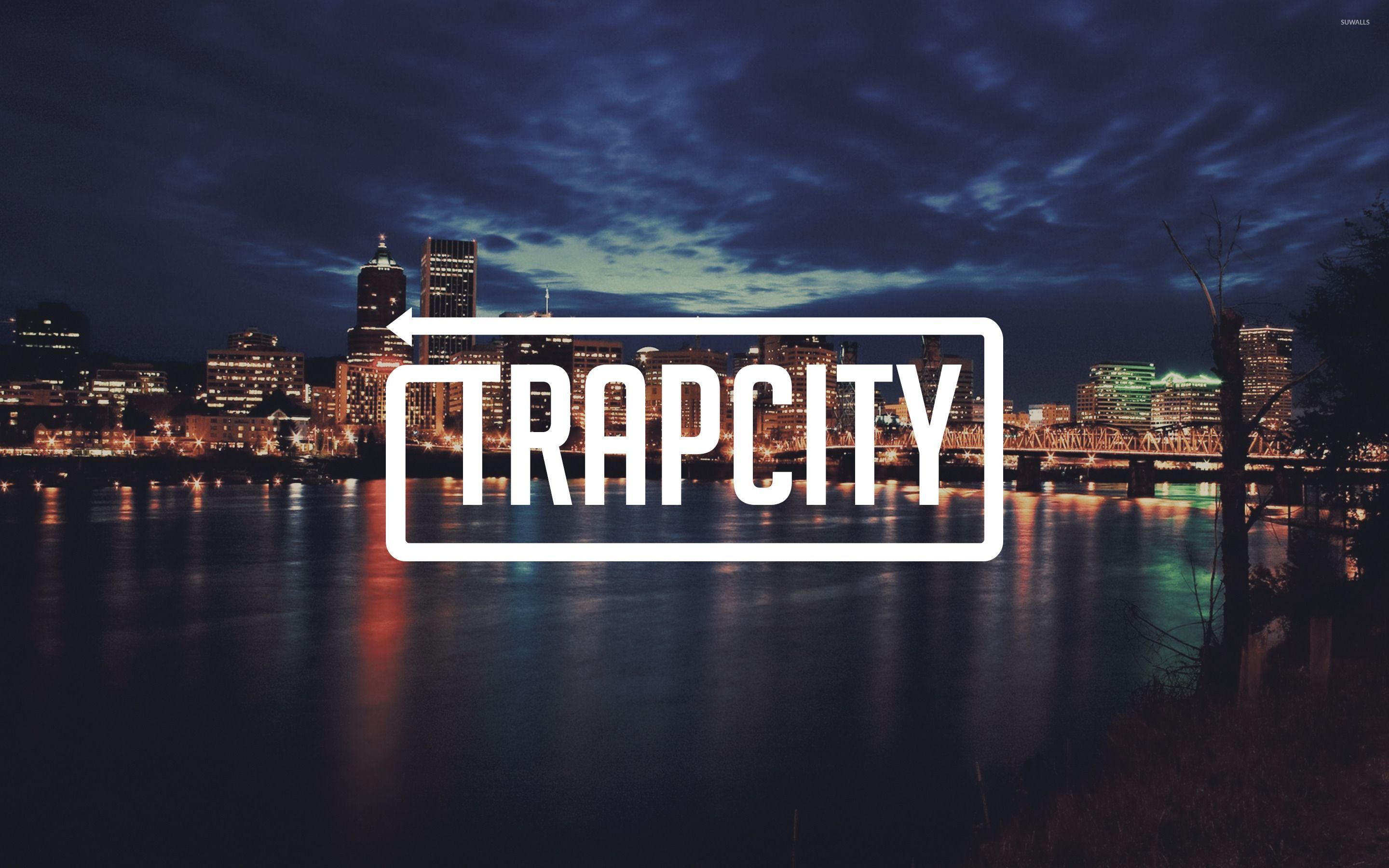 Trap City in a cloudy city night wallpaper wallpaper