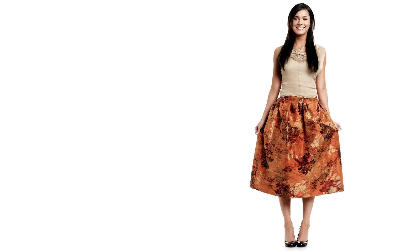 Megan Fox Orange Skirt wallpaper. Megan Fox Orange Skirt stock
