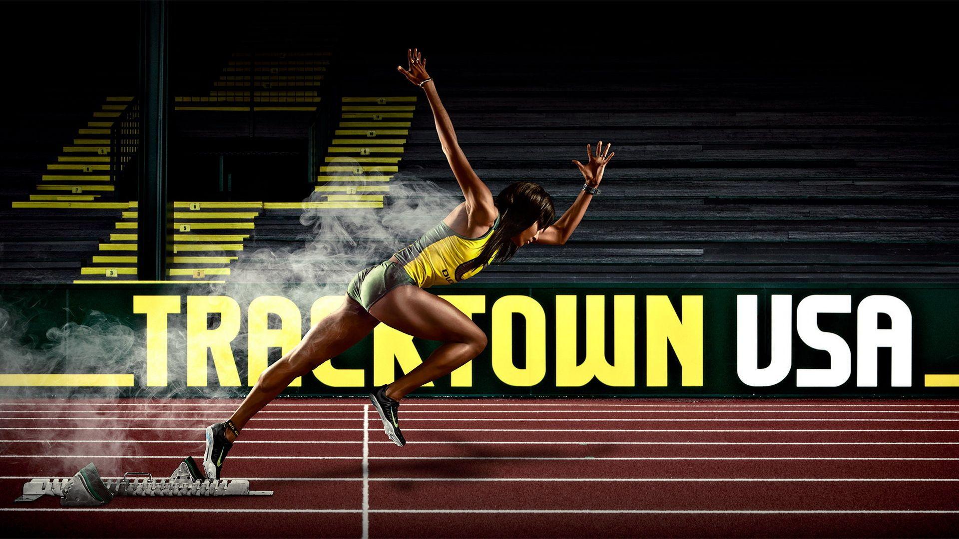 Strong Female Athlete On Running Tracktown USA