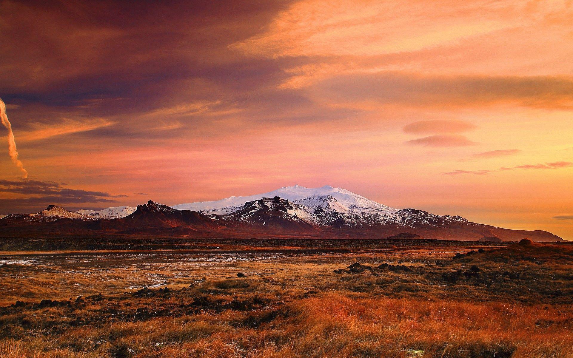 Plains and mountains in Iceland at sunset wallpaper and image