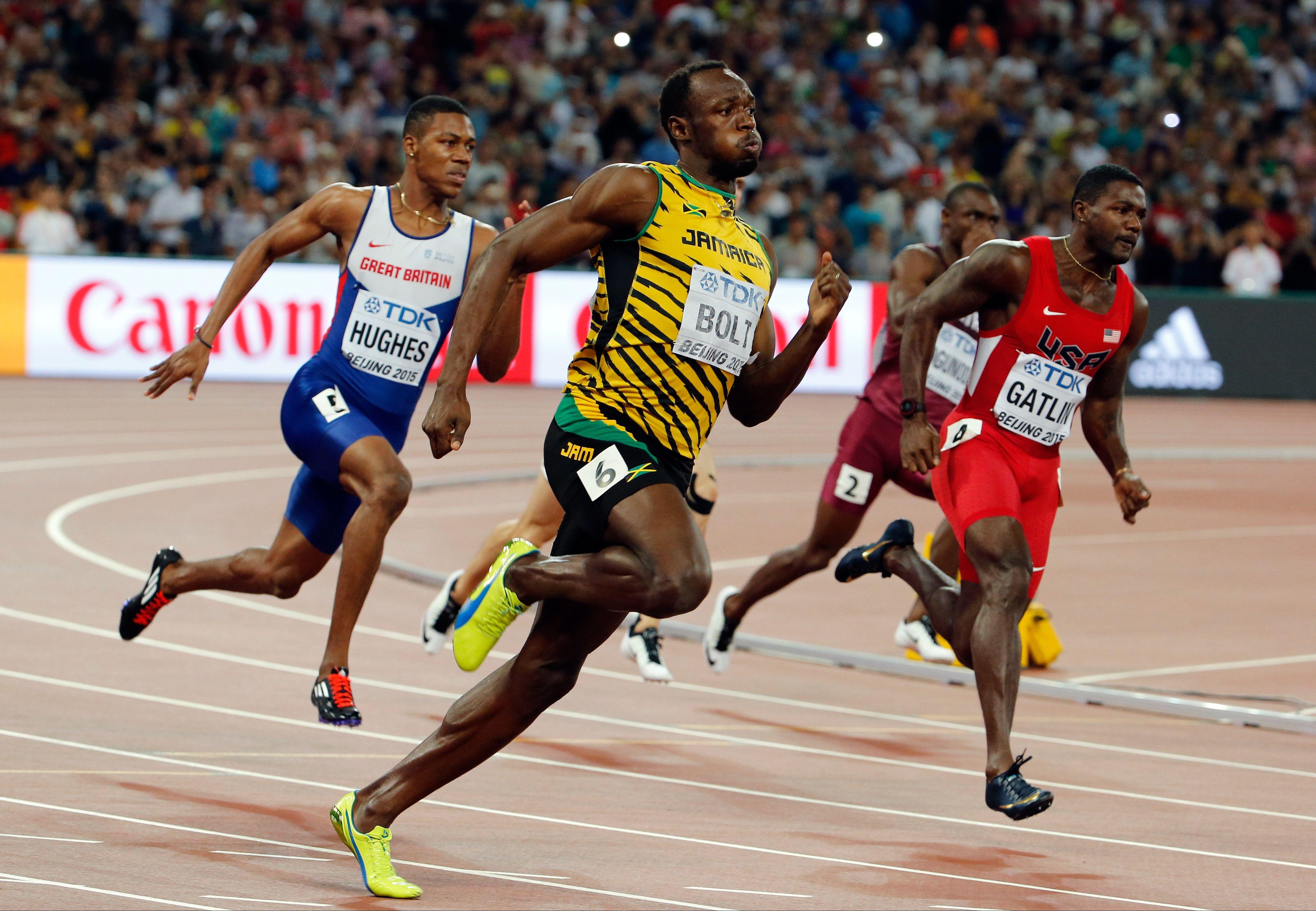 Bolt outduels Gatlin in 200, snatches record 10th world