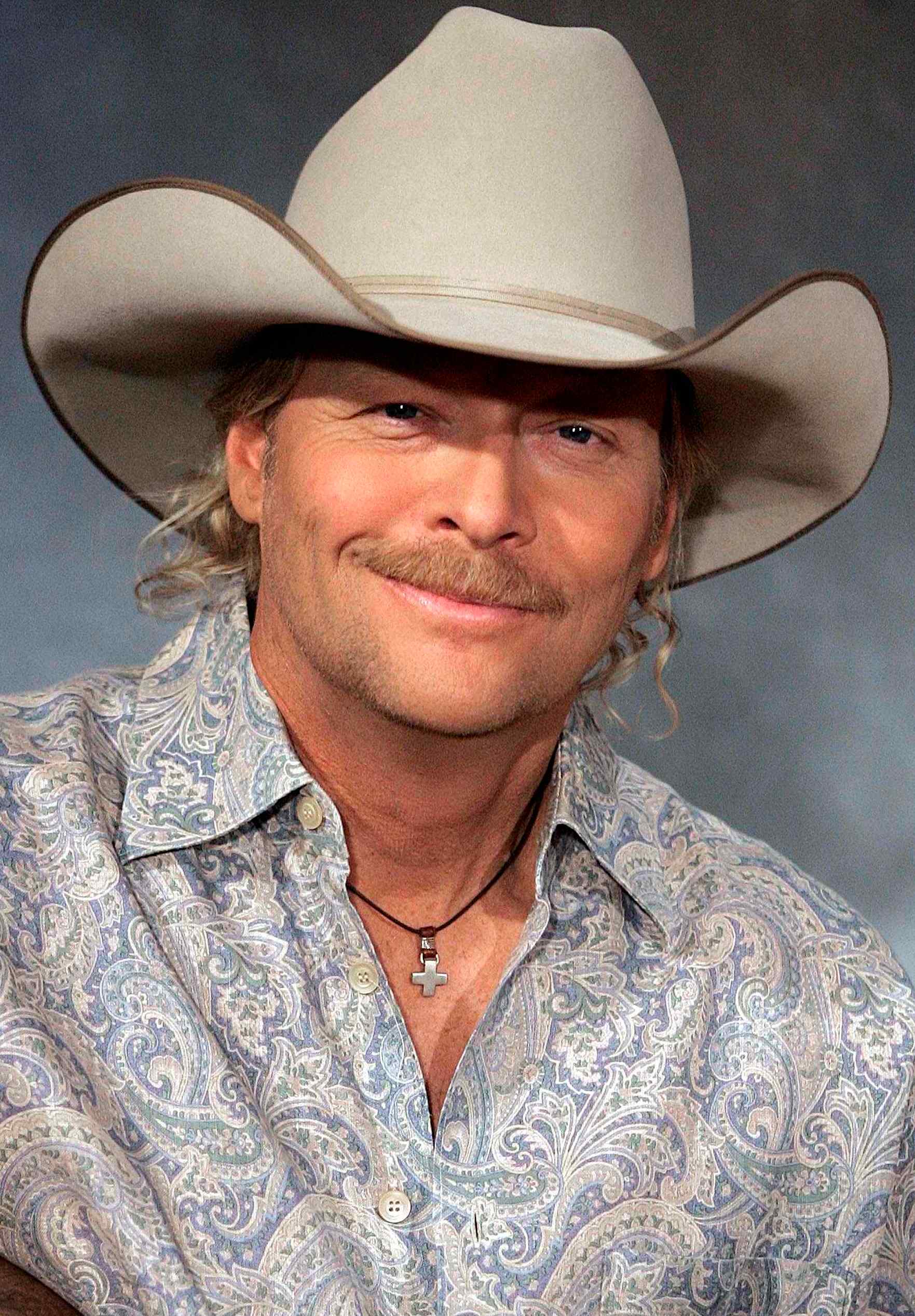 I love Alan Jackson. He did two gospel CD's, Precious Memories