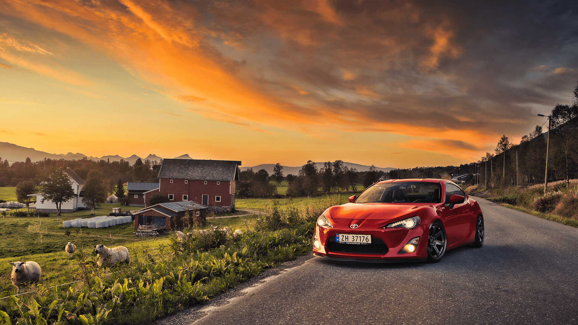 Red Toyota GT86 on a rural highway wallpapers and image