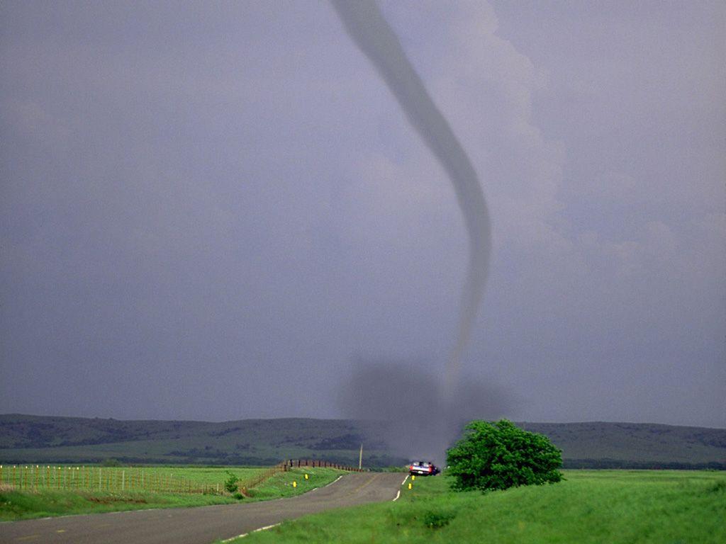 Tornado Touching Down By Country Road