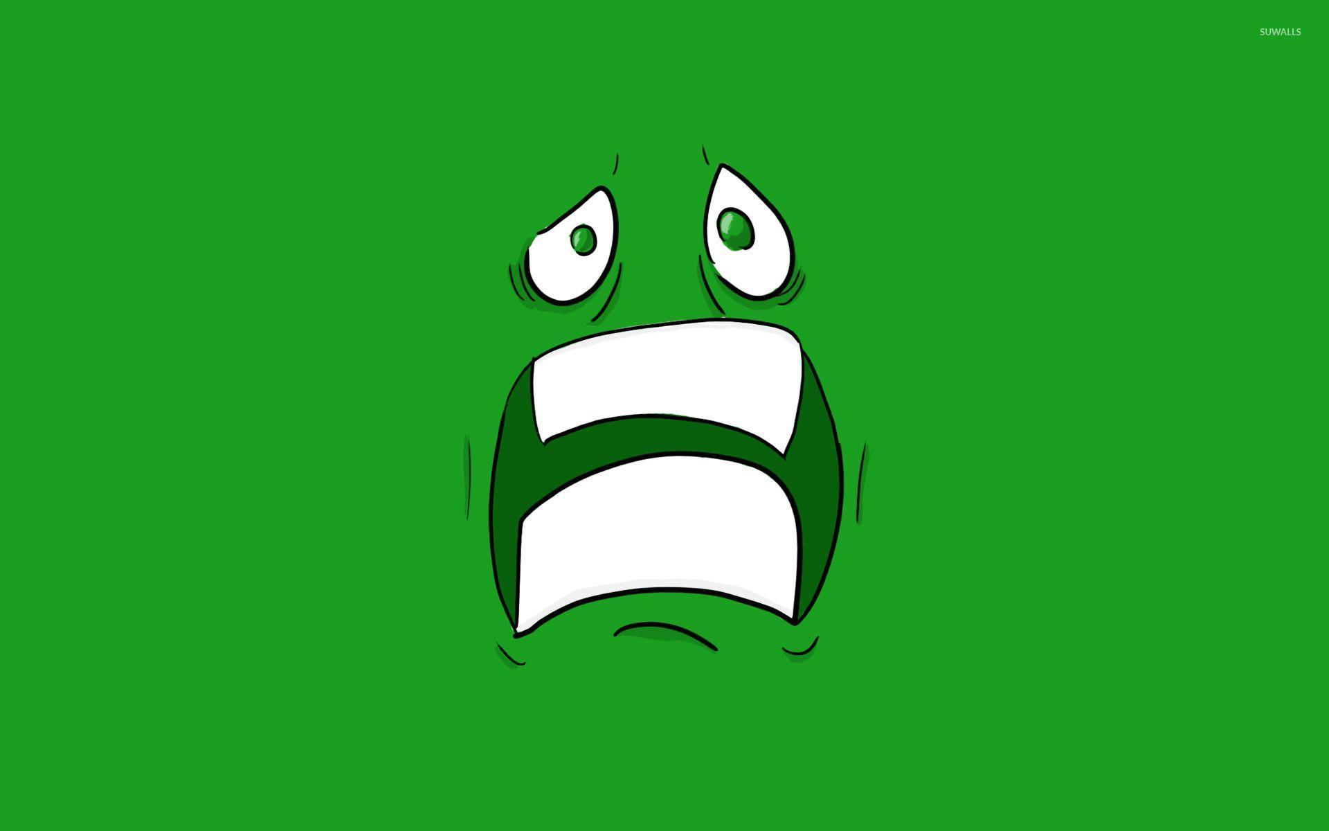 Scared green face with green eyes wallpaper wallpaper