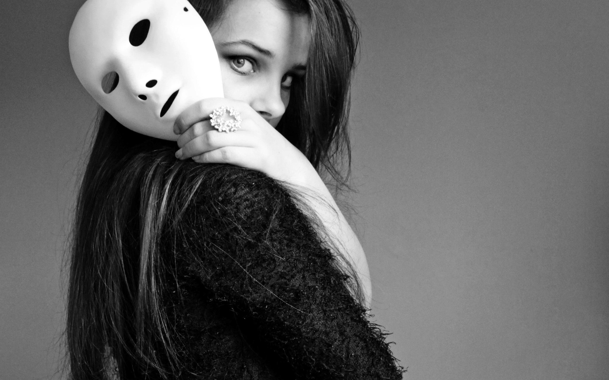 Beautiful Girl Hiding Face with Mask