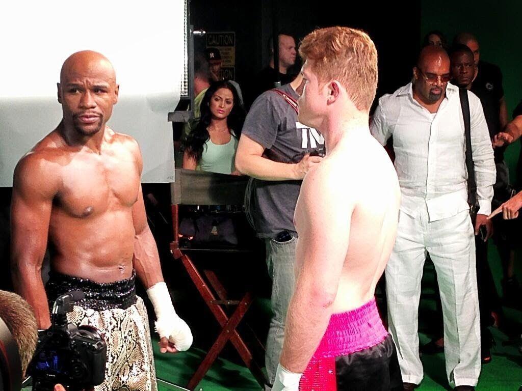 FLOYD MAYWEATHER AND SAUL CANELO ALVAREZ FACE OFF FOR THE FIRST
