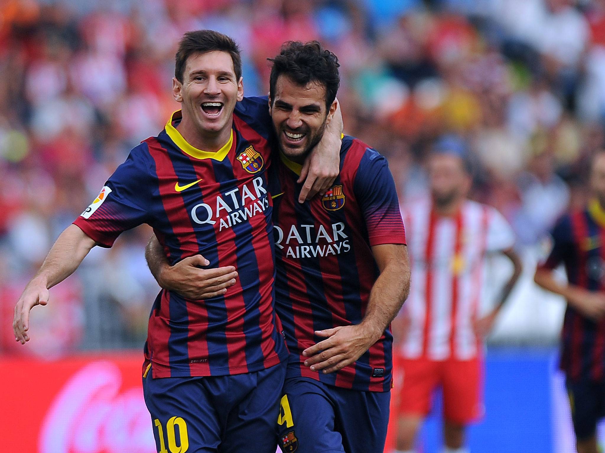 The football players of Barcelona Francesc Fabregas and Lionel