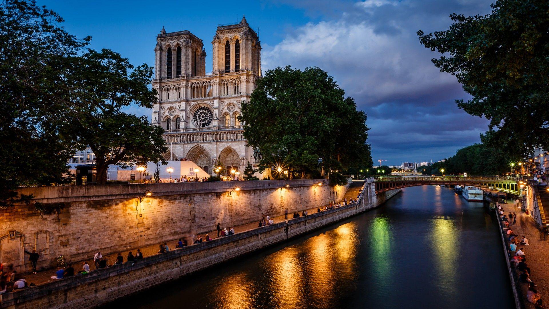 Notre Dame De Paris Cathedral And Seine River In The Evening, Pa