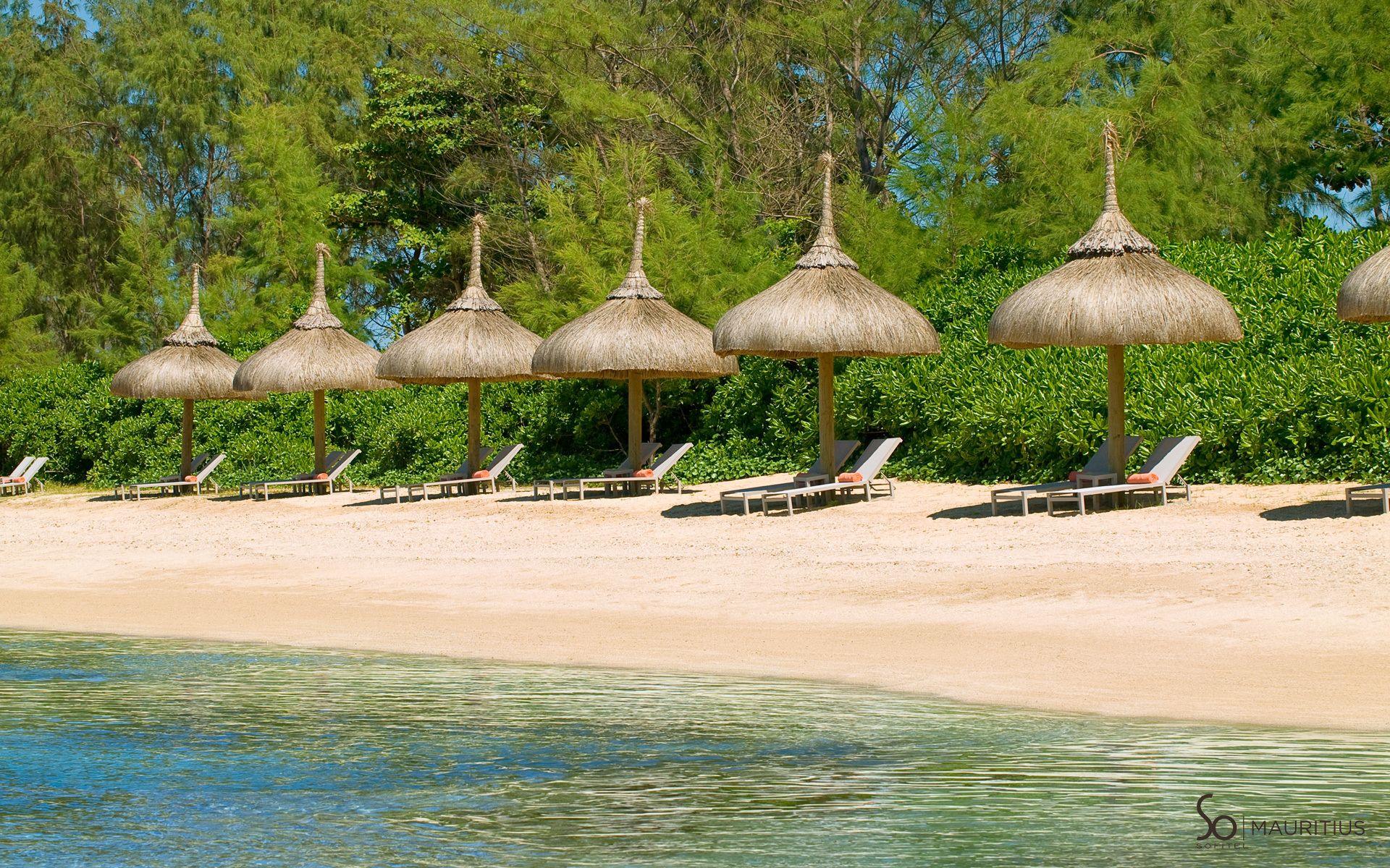 Thatched umbrellas on the Mauritius beach