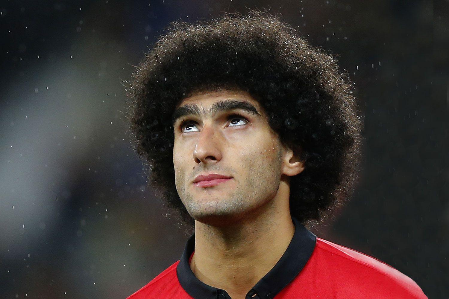 Fellaini finally cut his hair off!