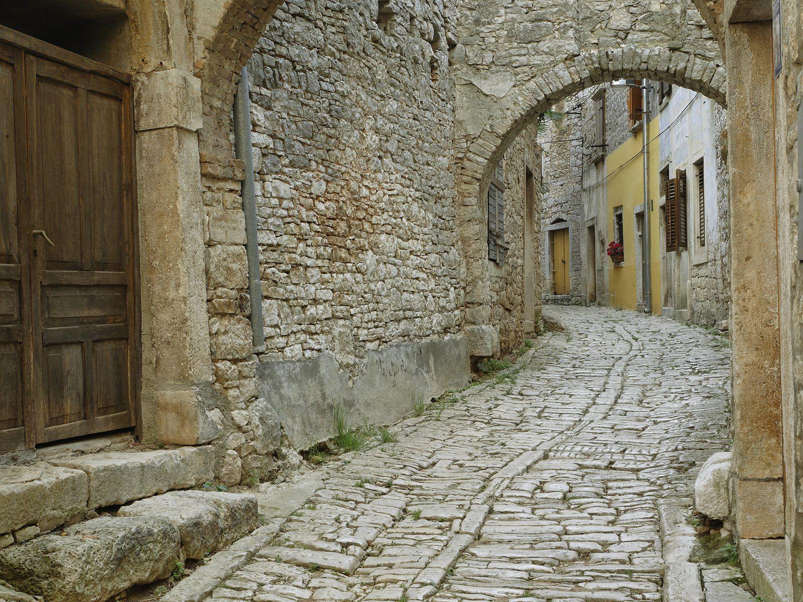 The narrow street of old city wallpaper and image