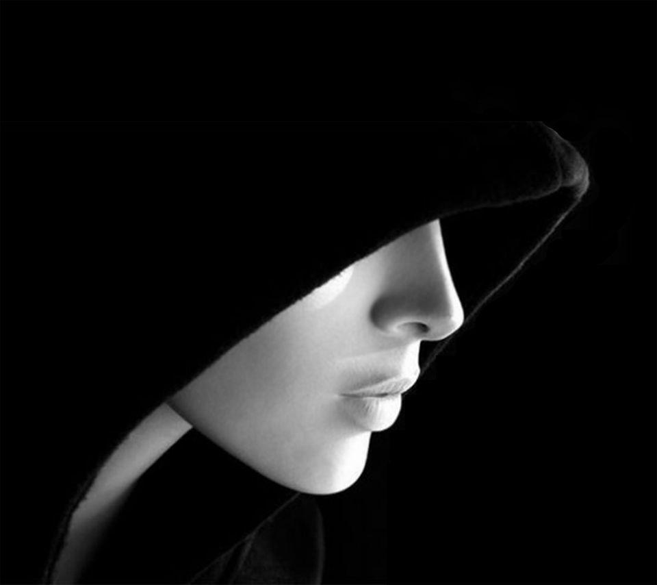 Beauty wearing black hat