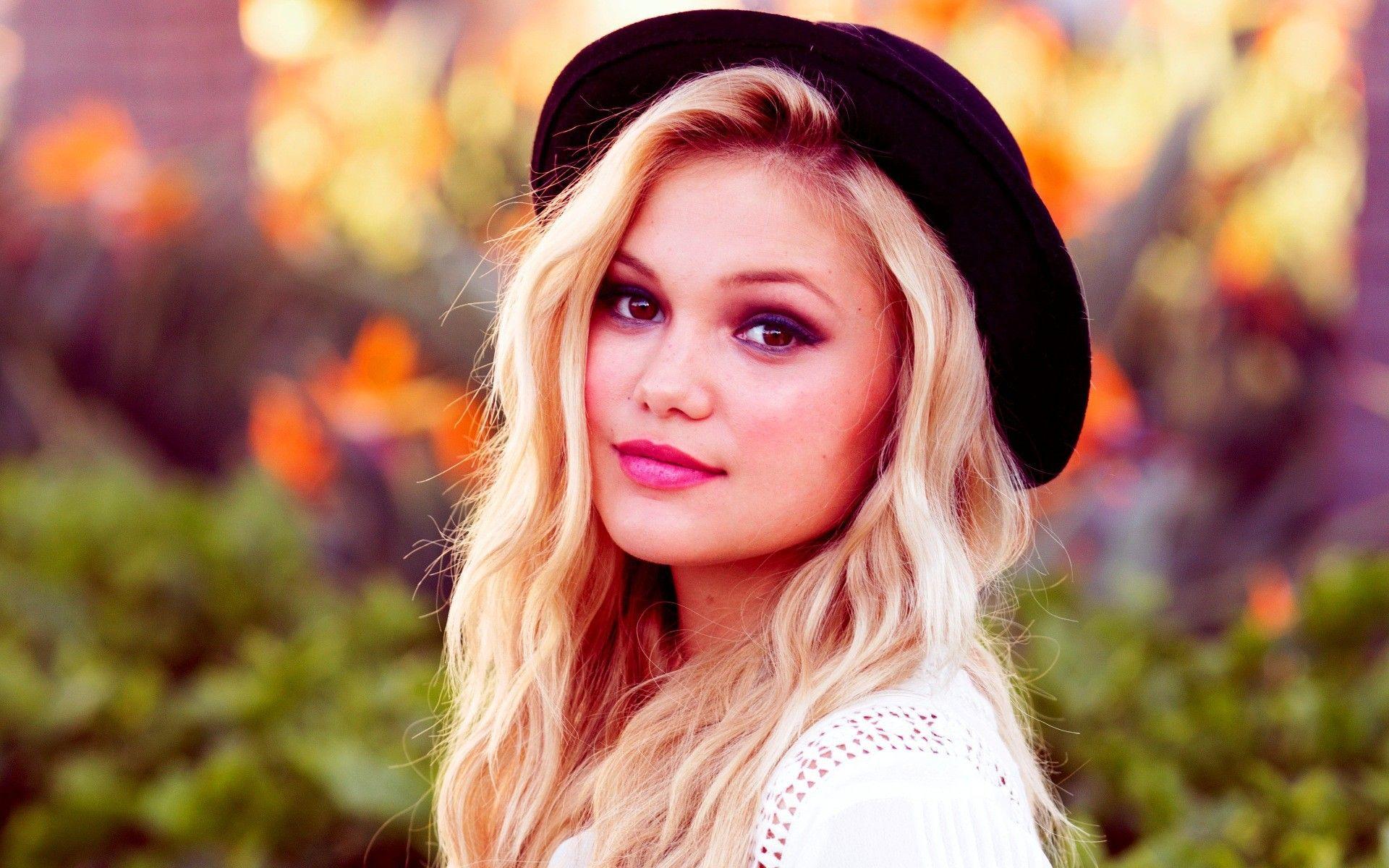 Blonde in a black hat Olivia Holt wallpapers and image.