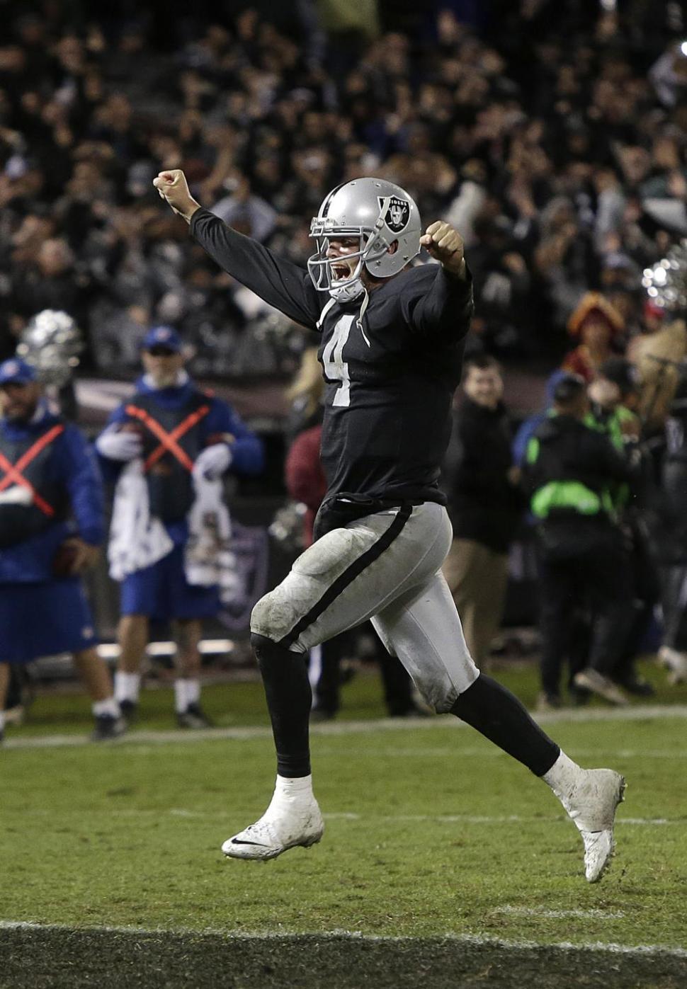 Raiders win first game of season, 24- over Chiefs. Derek carr