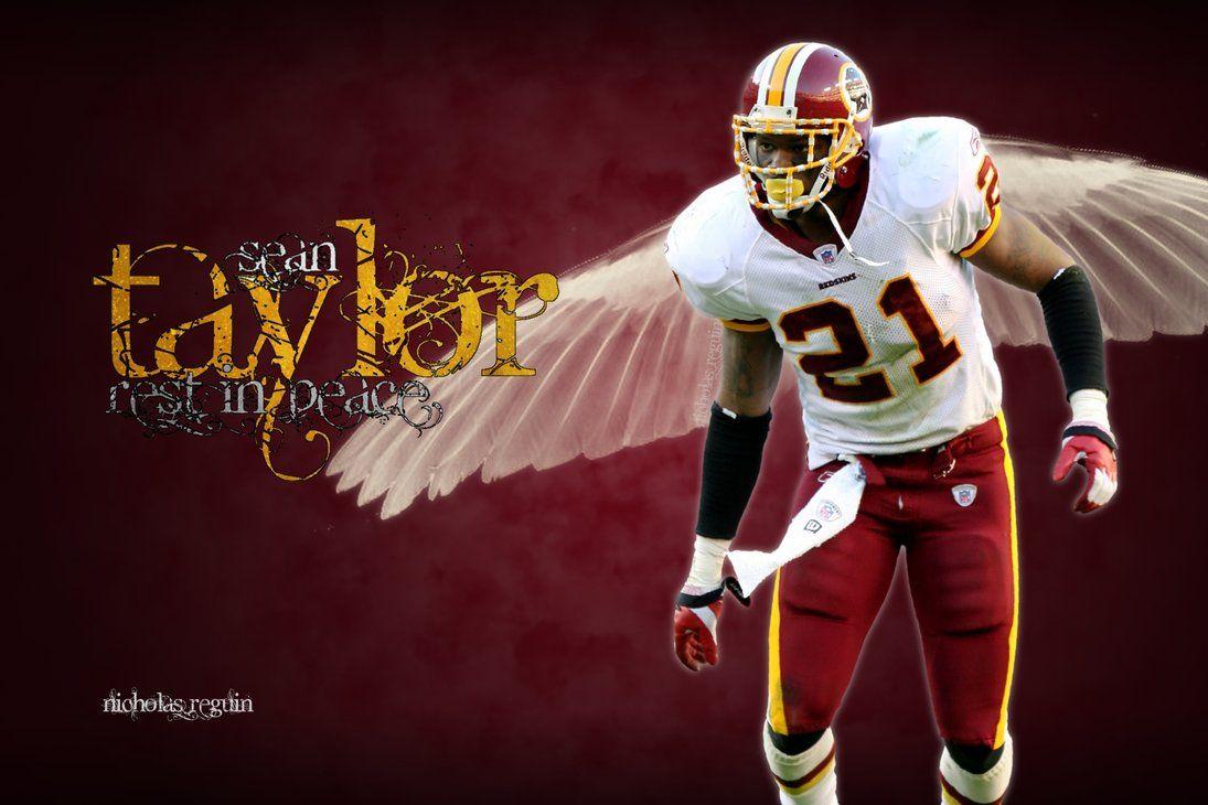 Download Sean Taylor Carrying The Football Wallpaper