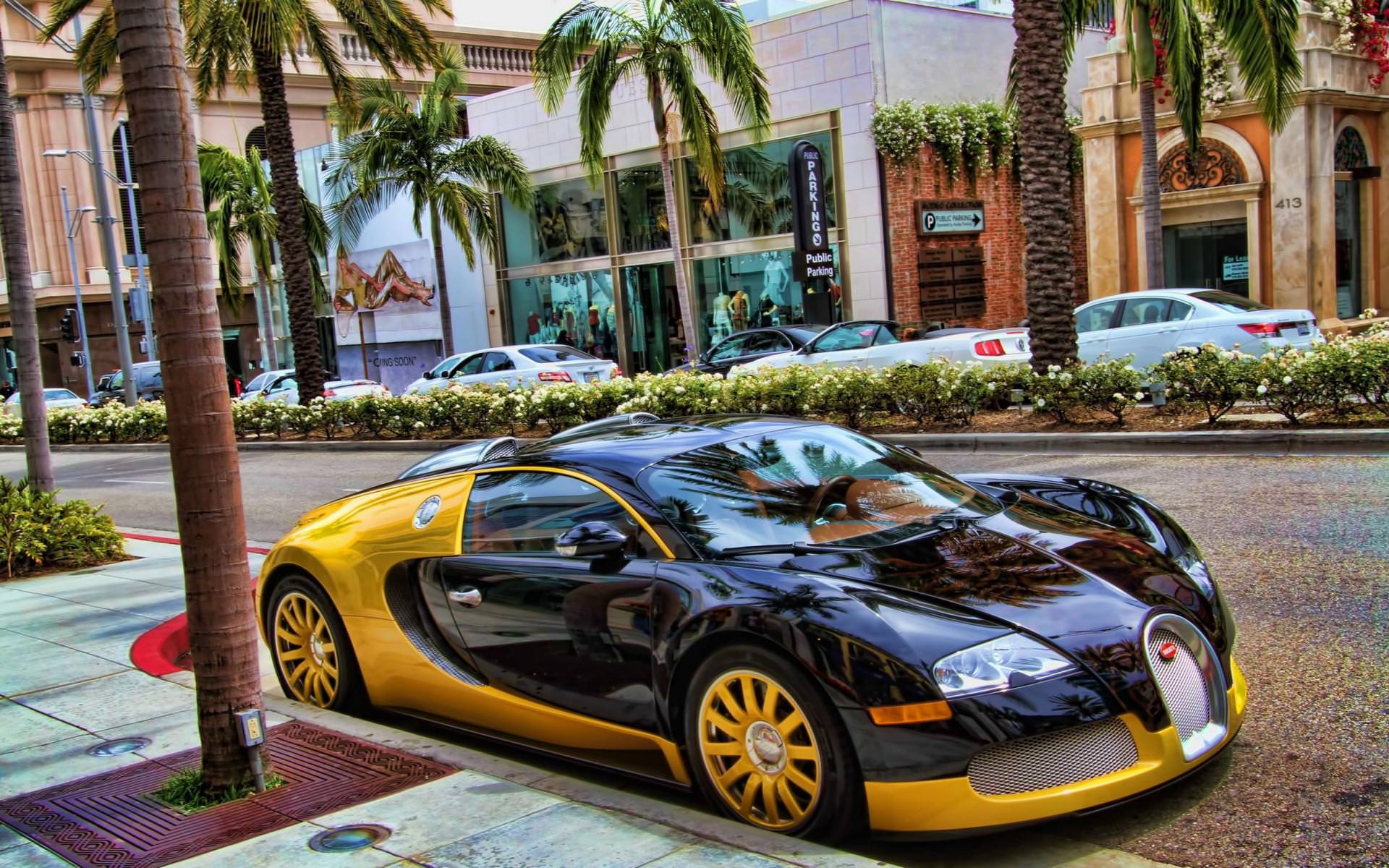 Black and yellow Bugatti Veyron Bijan front side view parked