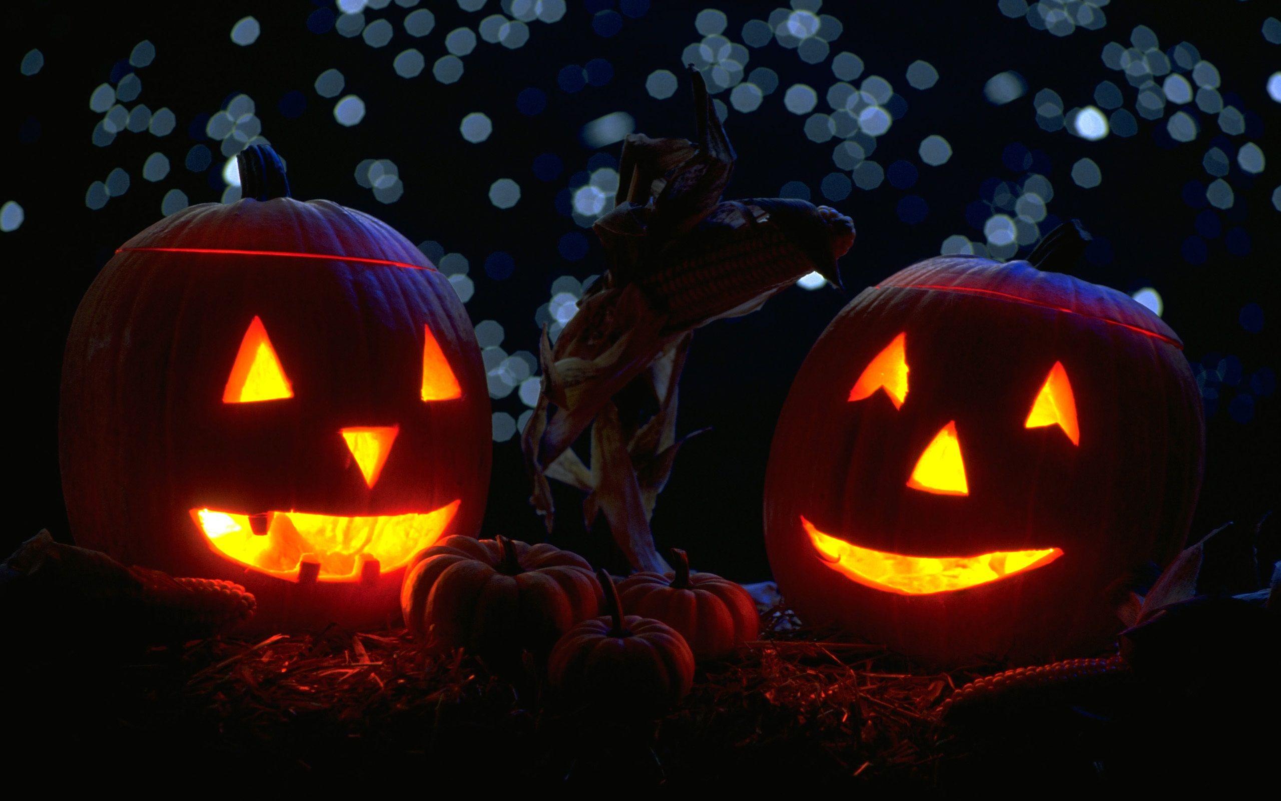 pumpkins with candles in the night halloween widescreen wallpaper