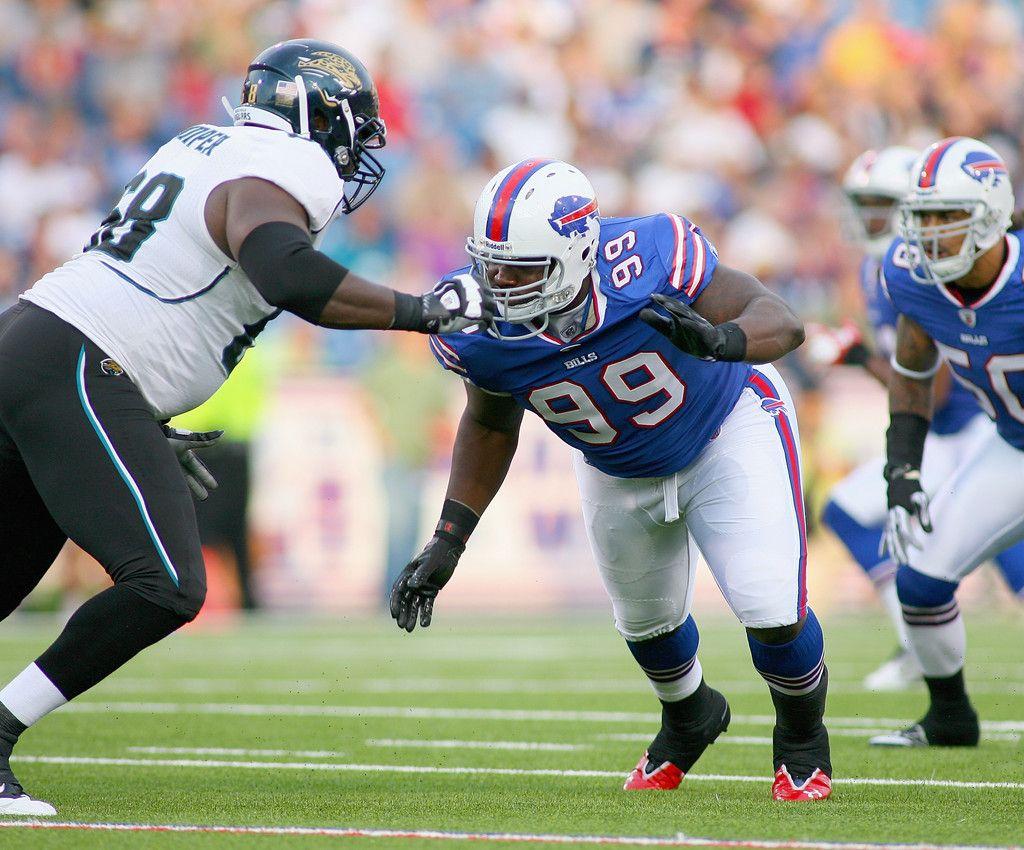 Guy Whimper and Marcell Dareus Photo Photo