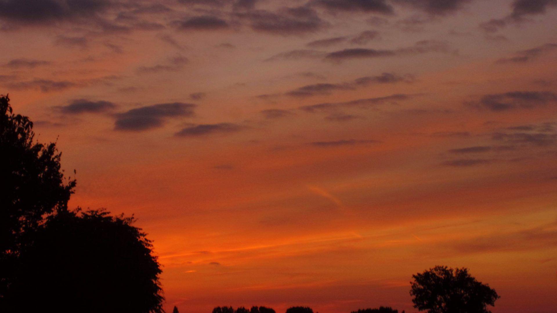 Sunsets wallpaper: Lakeside Sunset Silhouette Bench Wallpaper