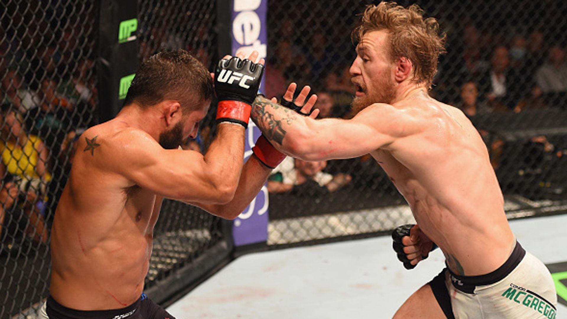 UFC 189 Results: Conor McGregor wins interim title with second