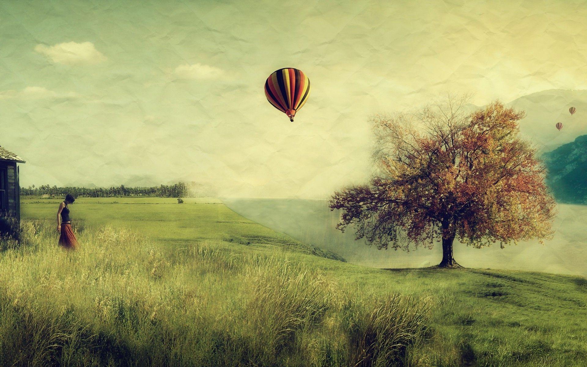 Hot air balloons over the foggy field Wallpaper