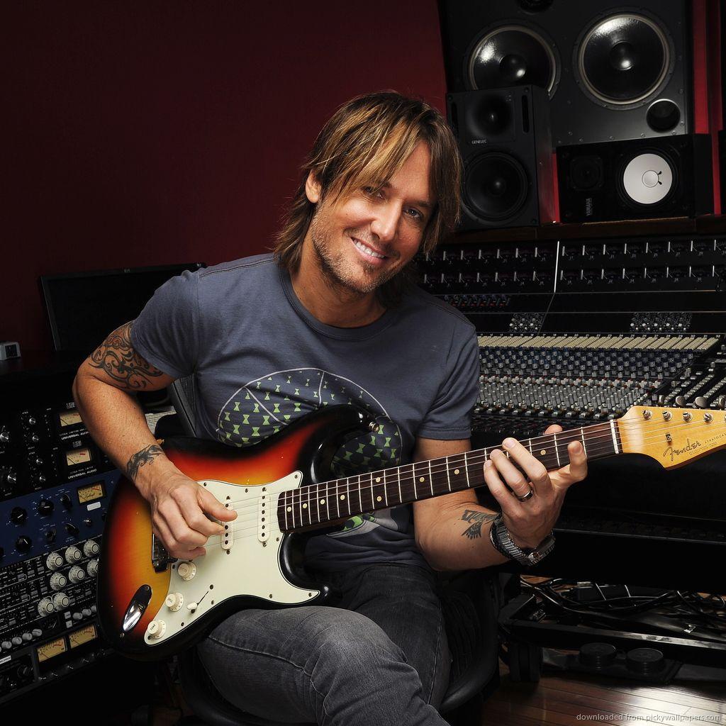 Download Keith Urban Playing Guitar Wallpaper For iPad