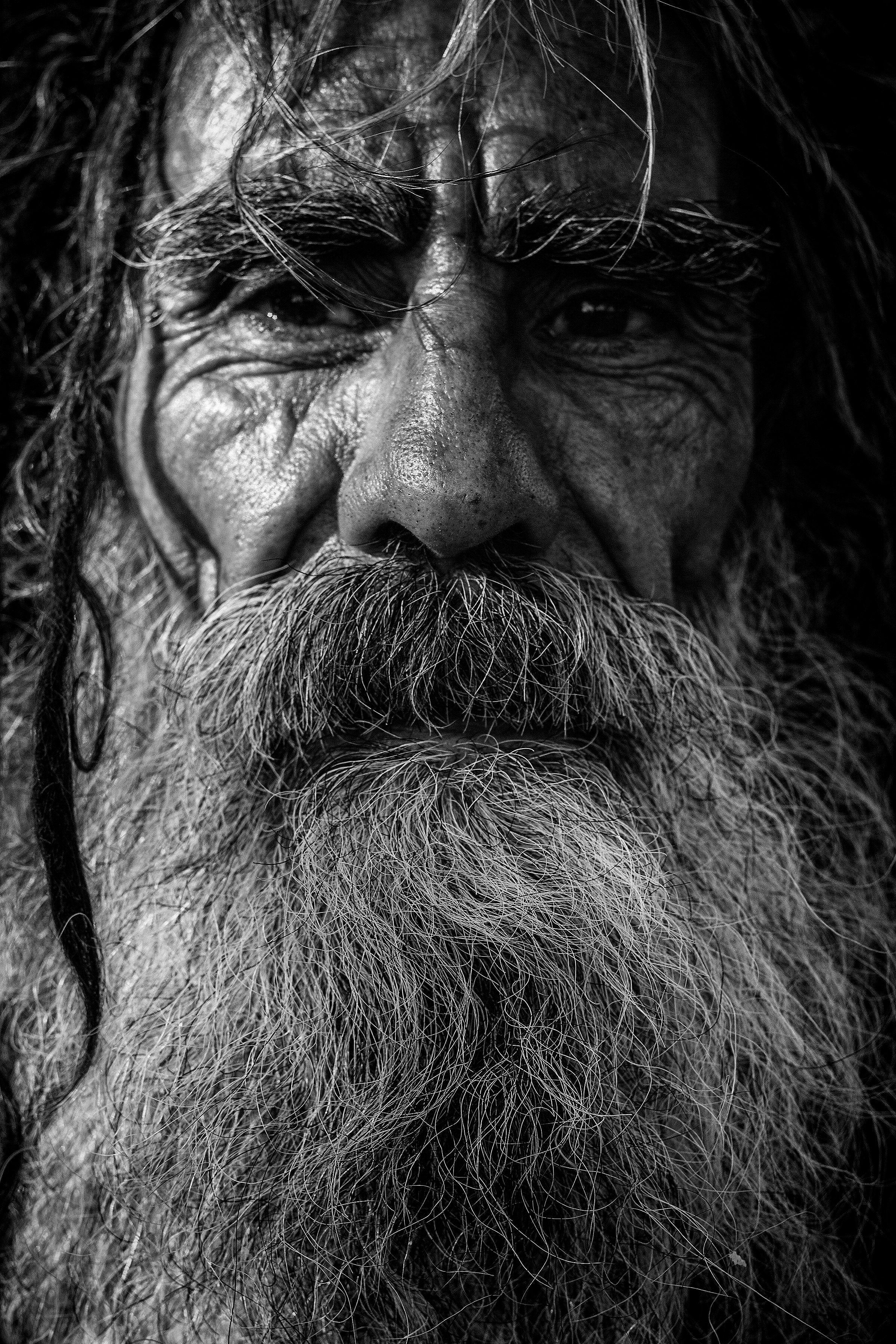 grayscale photo of a man with beard free image