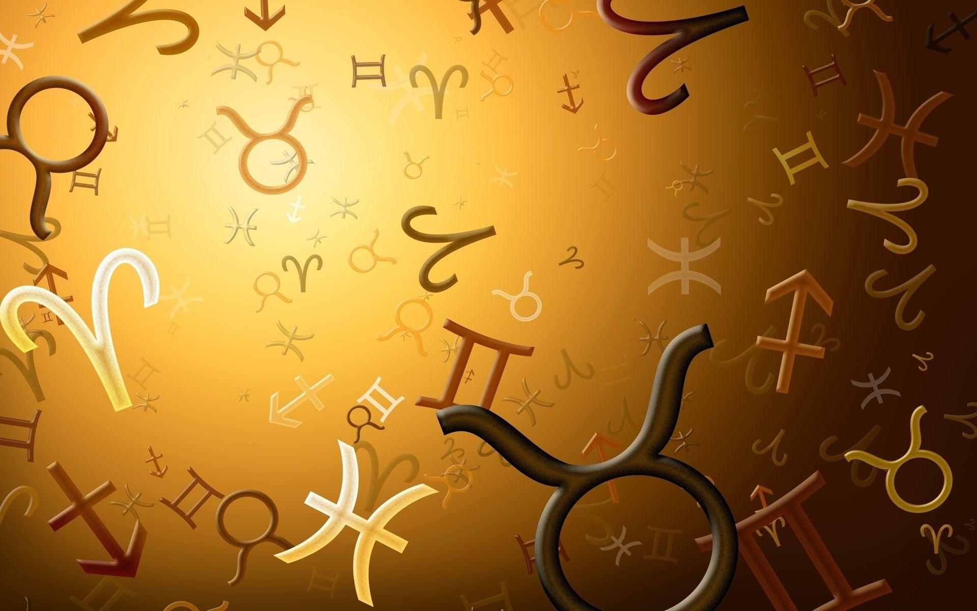 Zodiac signs Signs of the Zodiac soar on a brown background