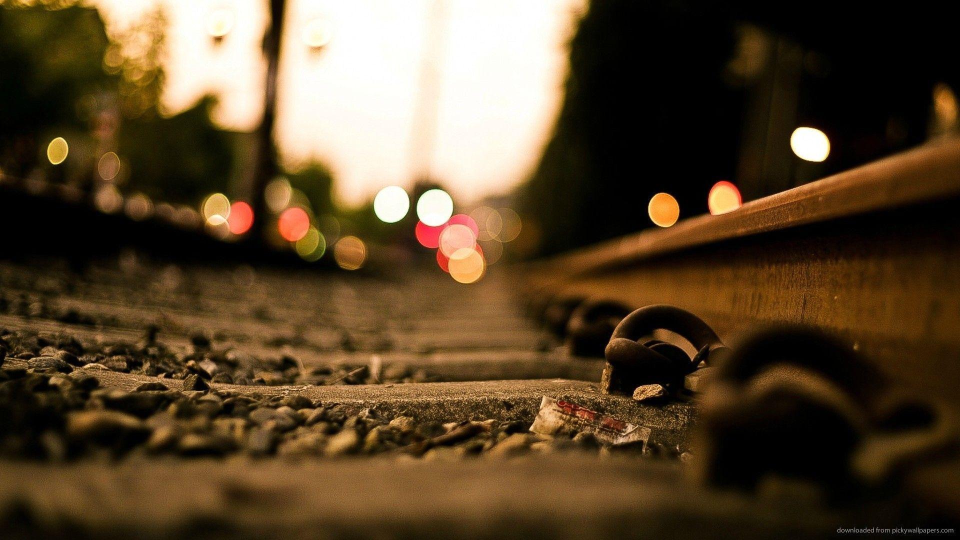 Download 1920x1080 Train Tracks And Sparkling Lights Wallpaper