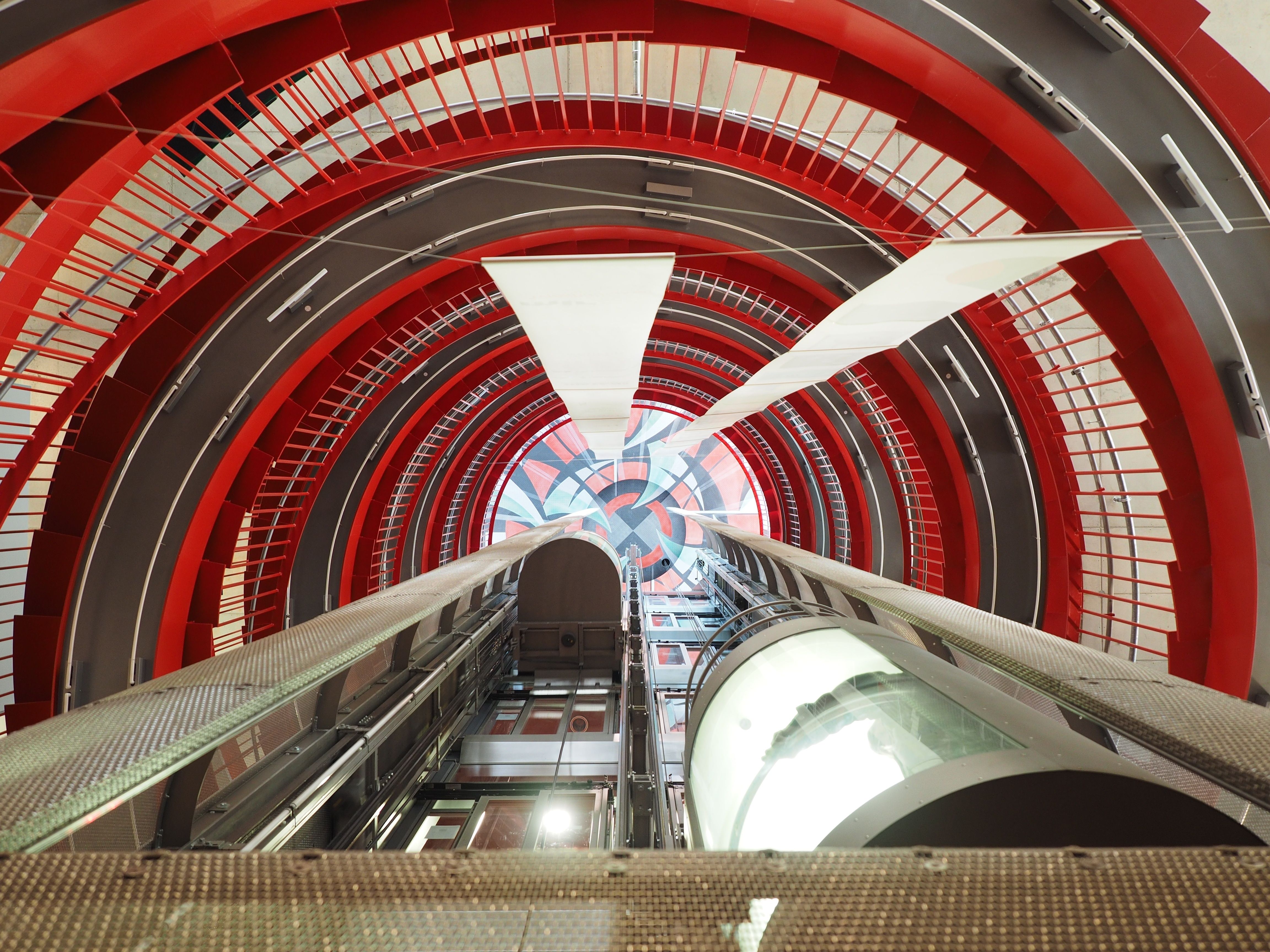 photo of red and grey tunnel free image